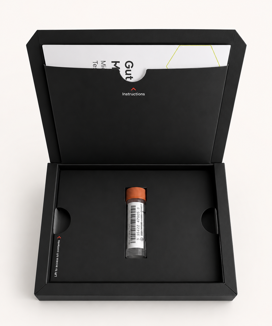 The opened Forth gut microbiome test kit, showing the instructions booklet tucked into the lid pocket and a sealed stool sample collection tube with a barcode label in the inner tray.